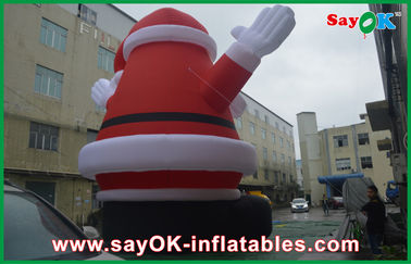 オックスフォードの布との膨脹可能な休日の装飾 8m の高さの赤く大きいクリスマス サンタクロース