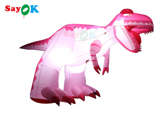 恐竜の湿った証拠を広告するピンクの 4m の膨脹可能な漫画のキャラクター