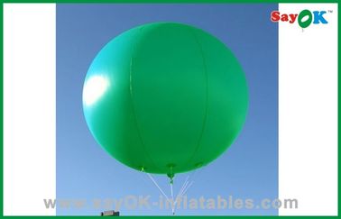 休日の膨脹可能な気球の鮮やかな緑色の膨脹可能なヘリウムの気球