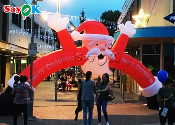 店の装飾のためにクリスマスの膨脹可能なサンタのアーチを広告するクリスマスの膨脹可能なアーチ道