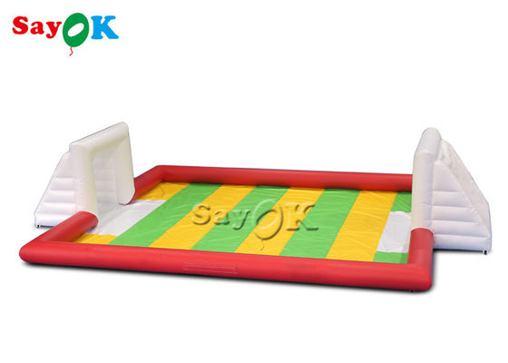 膨脹可能なパーティー用のゲーム10x7m赤いポリ塩化ビニールの膨脹可能なスポーツのゲームの謝肉祭の爆発のサッカー競技場